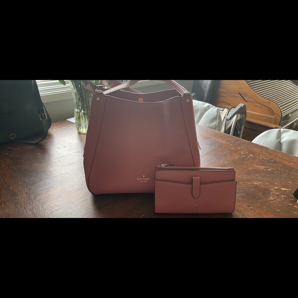 Pink medium Kate Spade Leila with matching wallet.